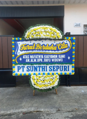 Papan Bunga Duka di Waropen Bawah