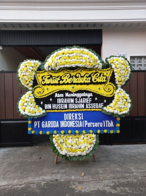 Papan Bunga Duka di Waropen Bawah