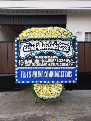 Papan Bunga Duka di Waropen Bawah
